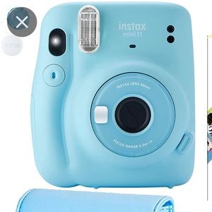 Blue Polaroid camera with bag